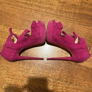 Christian Louboutin pink suede heels with three bow bootie design